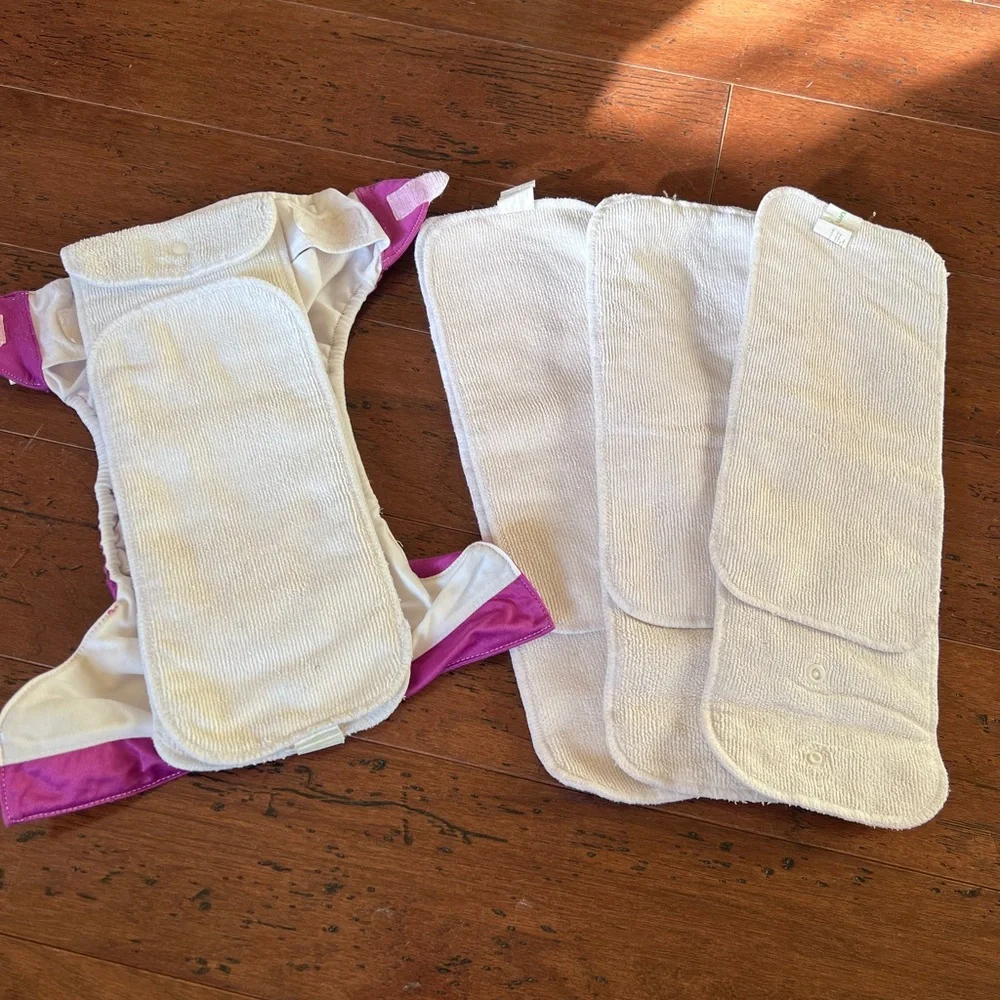 4 Bum Genius diapers shells and liners